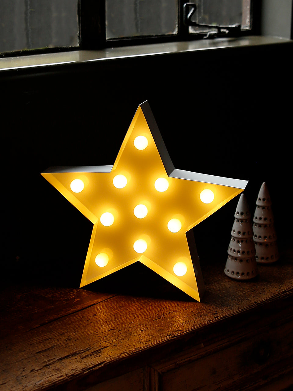 Stella di Carnevale in metallo bianco