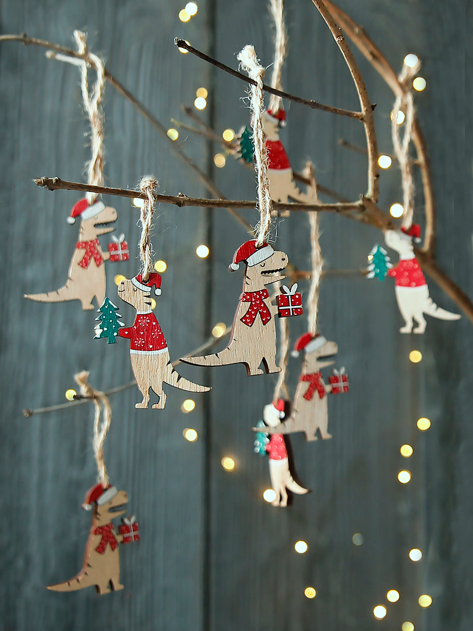 Set di dinosauri natalizi in legno